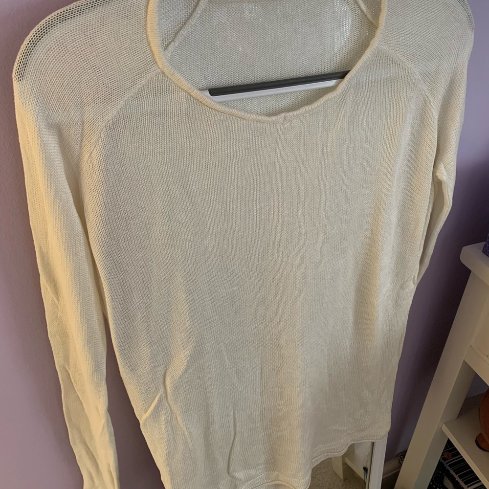 cream colored Brandy sweater